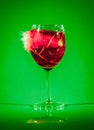 Glass with drink by bullet Royalty Free Stock Photo