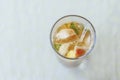 Glass of drink with fruits, ice and pimm's Royalty Free Stock Photo