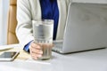 A glass of drinking water on office desk Royalty Free Stock Photo