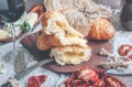 A glass of dry red wine and Italian Focaccia bread with cheese and olive oil and sun dried tomatoes. Selective focus. The Royalty Free Stock Photo