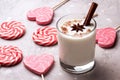 Glass of eggnog and candy cane Royalty Free Stock Photo