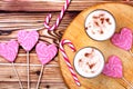 Glass of eggnog and candy cane Royalty Free Stock Photo