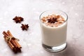 Glass of eggnog and candy cane Royalty Free Stock Photo
