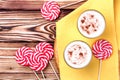 Glass of eggnog and candy cane Royalty Free Stock Photo