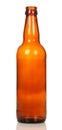 Glass empty brown beer bottle isolated on white. Royalty Free Stock Photo