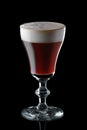 Glass of espresso martini isolated on black background Royalty Free Stock Photo