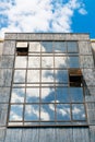 Glass facade with clouds reflections Royalty Free Stock Photo