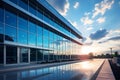 glass facade of a modern office building against a blue sky Royalty Free Stock Photo