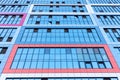 Glass facade of a multi-apartment high-rise residential building Royalty Free Stock Photo