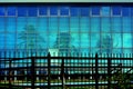 Glass facade with reflection of trees Royalty Free Stock Photo
