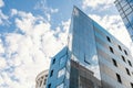 Glass facade texture of a modern office building. High tech architecture. Elements of urban design. Windows of Royalty Free Stock Photo