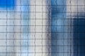Glass Facade with Wavy Panels and Grid Structure Royalty Free Stock Photo