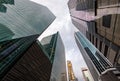 Glass Facades of skyscrapers of the financial district of Singapore on a cloudy evening, bottom view, wide lens, city Royalty Free Stock Photo