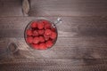 Glass filled with a raspberry