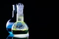 Glass flask with a chemical reagent Royalty Free Stock Photo