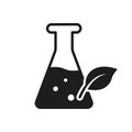 Glass Flask with Leaf Plant Silhouette Icon. Science Chemistry Natural Research Experiment Black Logo. Nature Bio Royalty Free Stock Photo