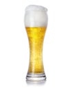 Glass of foamy light beer with bubbles on white background Royalty Free Stock Photo