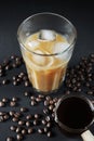 Glass of Frappuccino with ice and glass coffee scoop