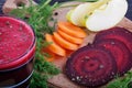 Glass of fresh beetroot, apple and carrot juice Royalty Free Stock Photo