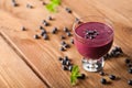 Glass of fresh blueberry smoothie