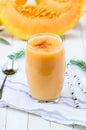 Glass of fresh cantaloupe smoothie Royalty Free Stock Photo