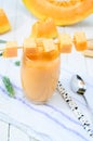 Glass of fresh cantaloupe smoothie Royalty Free Stock Photo