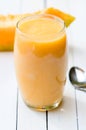 Glass of fresh cantaloupe smoothie Royalty Free Stock Photo