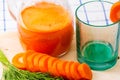 Glass of fresh carrot juice, dill sprigs, sliced carrots Royalty Free Stock Photo