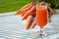 A glass of fresh carrot juice