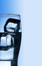 Glass with fresh cool water and ice Royalty Free Stock Photo