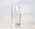 Glass of fresh drink water on grey backgrund