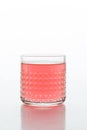 A glass of fresh drink. Trendy color 2019, living coral