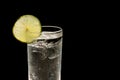 Glass of fresh drinking water with slice of lime isolated Royalty Free Stock Photo
