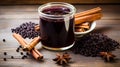 Glass of fresh elderberry syrup with cinnamon stick, brown sugar, star anise. generative ai