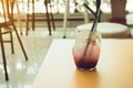 a glass of fresh grape cocktail soda