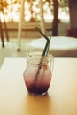 a glass of fresh grape cocktail soda