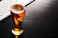 Glass of lager beer on table Royalty Free Stock Photo