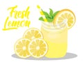 A glass of fresh lemon juice on a yellow background