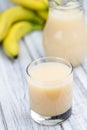 Glass with fresh made Banana juice Royalty Free Stock Photo