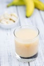 Glass with fresh made Banana juice Royalty Free Stock Photo