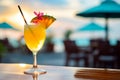 Glass of fresh non-alcoholic alcoholic yellow drink tropical cocktail drinking beverage juicy refreshing icy cold Royalty Free Stock Photo