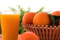 Glass of fresh orange juice with fresh fruits on wooden table Royalty Free Stock Photo