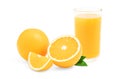 Glass of fresh orange juice with fruits cut in half and sliced with green leaf Royalty Free Stock Photo