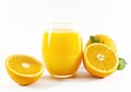 Glass of fresh orange juice with fruits cut in half and sliced with green leaf isolated on white background, clipping path Royalty Free Stock Photo