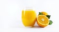 Glass of fresh orange juice with fruits cut in half and sliced with green leaf isolated on white background, clipping path Royalty Free Stock Photo