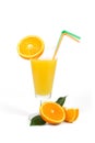 Glass of fresh orange juice with green and orange tubule isolated on white