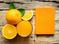A glass of fresh orange juice and group of fresh orange fruits Royalty Free Stock Photo