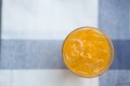 A glass of fresh orange juice with ice cubes Royalty Free Stock Photo