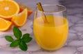 A glass of fresh orange juice on a slab. Close-up. Royalty Free Stock Photo