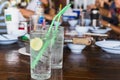 Glass of fresh sparkling water with slice of lime on table. Royalty Free Stock Photo
